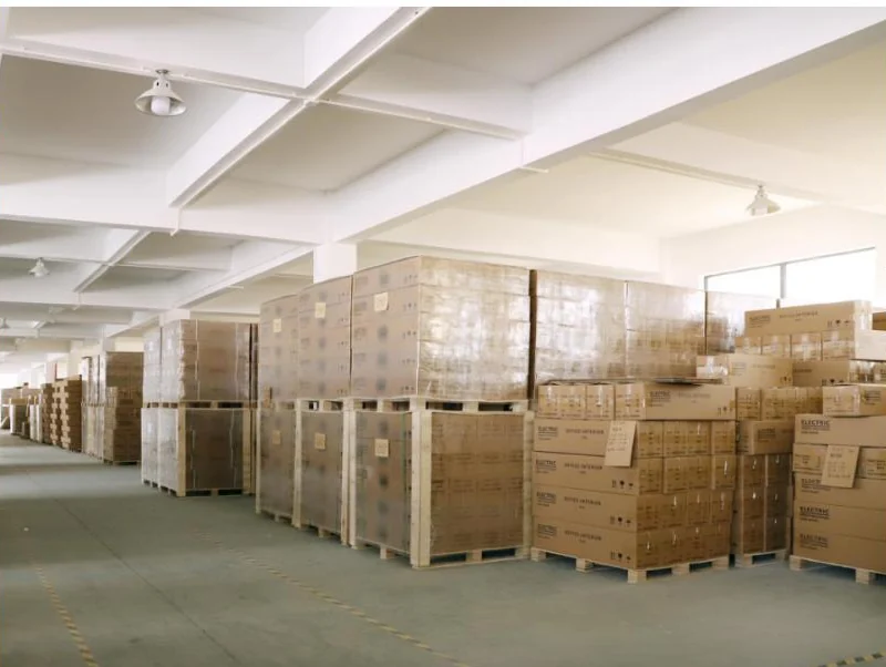 Packed cartons arranged in the NATE warehouse