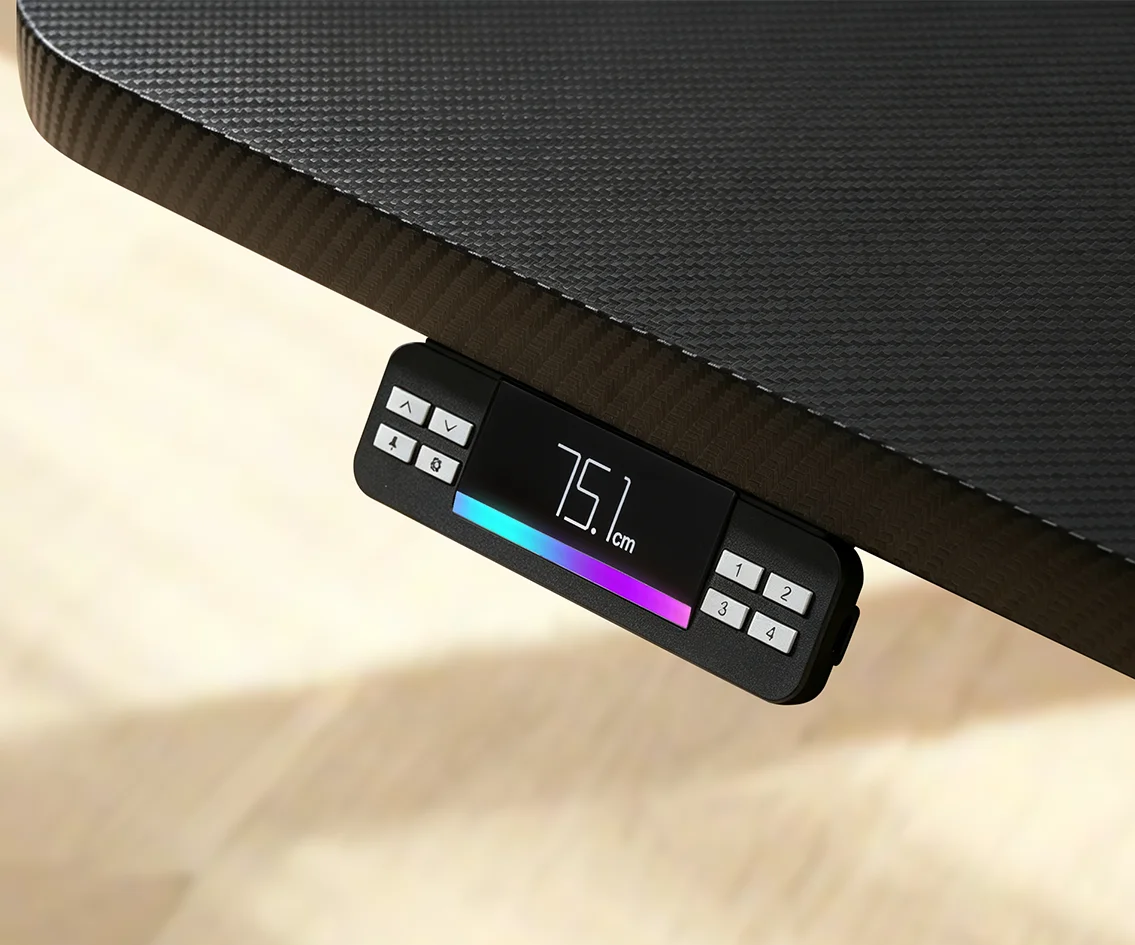 Height adjustment handset installed beneath the edge of an oak desktop