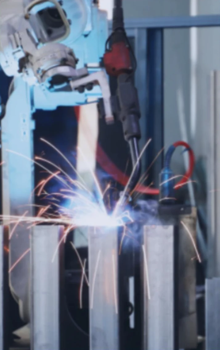 Robotic welding equipment shown in the NATE company presentation